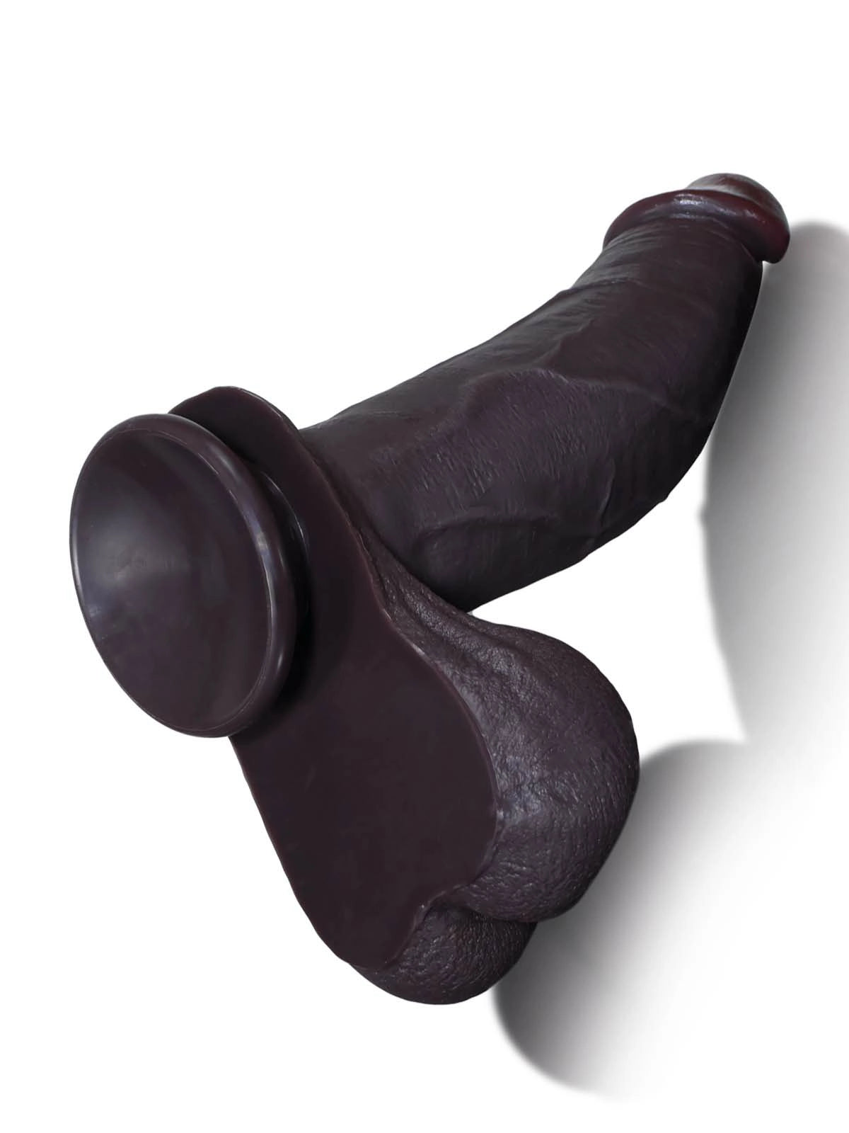 Magnus - Realistischer Dildo in Schwarz mit gleitender Haut - 26,5 cm