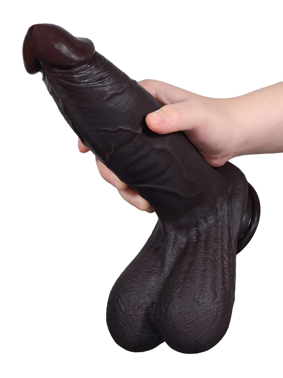 Magnus - Realistischer Dildo in Schwarz mit gleitender Haut - 26,5 cm