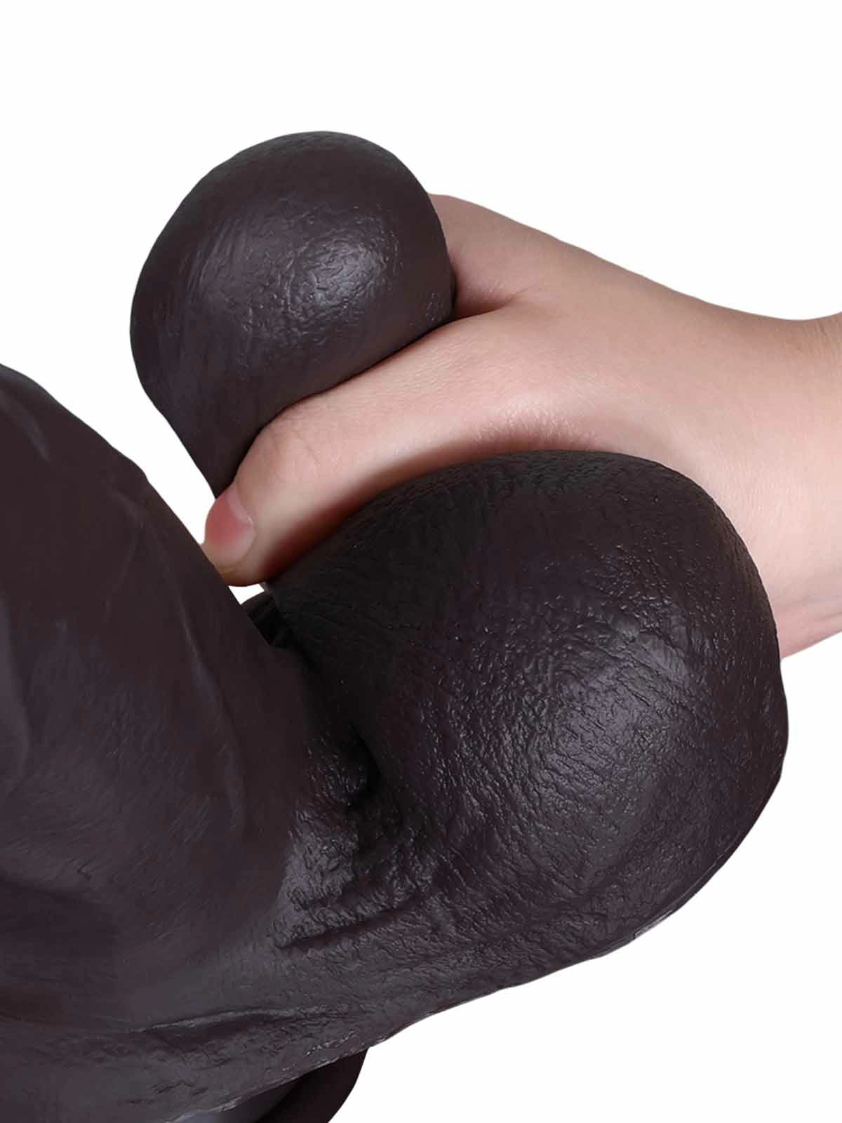 Magnus - Realistischer Dildo in Schwarz mit gleitender Haut - 26,5 cm